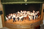 La Banda de Música y su Escuela llenan el Auditorio de la Caixa Rural en su Concierto Extraordinario de Navidad